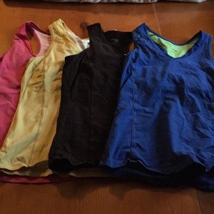 Lot of 4 multicolor danskin now exercise tanks